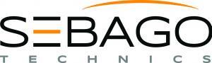 Sebago Technics logo featuring a stylized 'SEBAGO' with an orange hyphen within the 'E' and a curved orange line above it, and the word 'TECHNICS' in gray letters below.