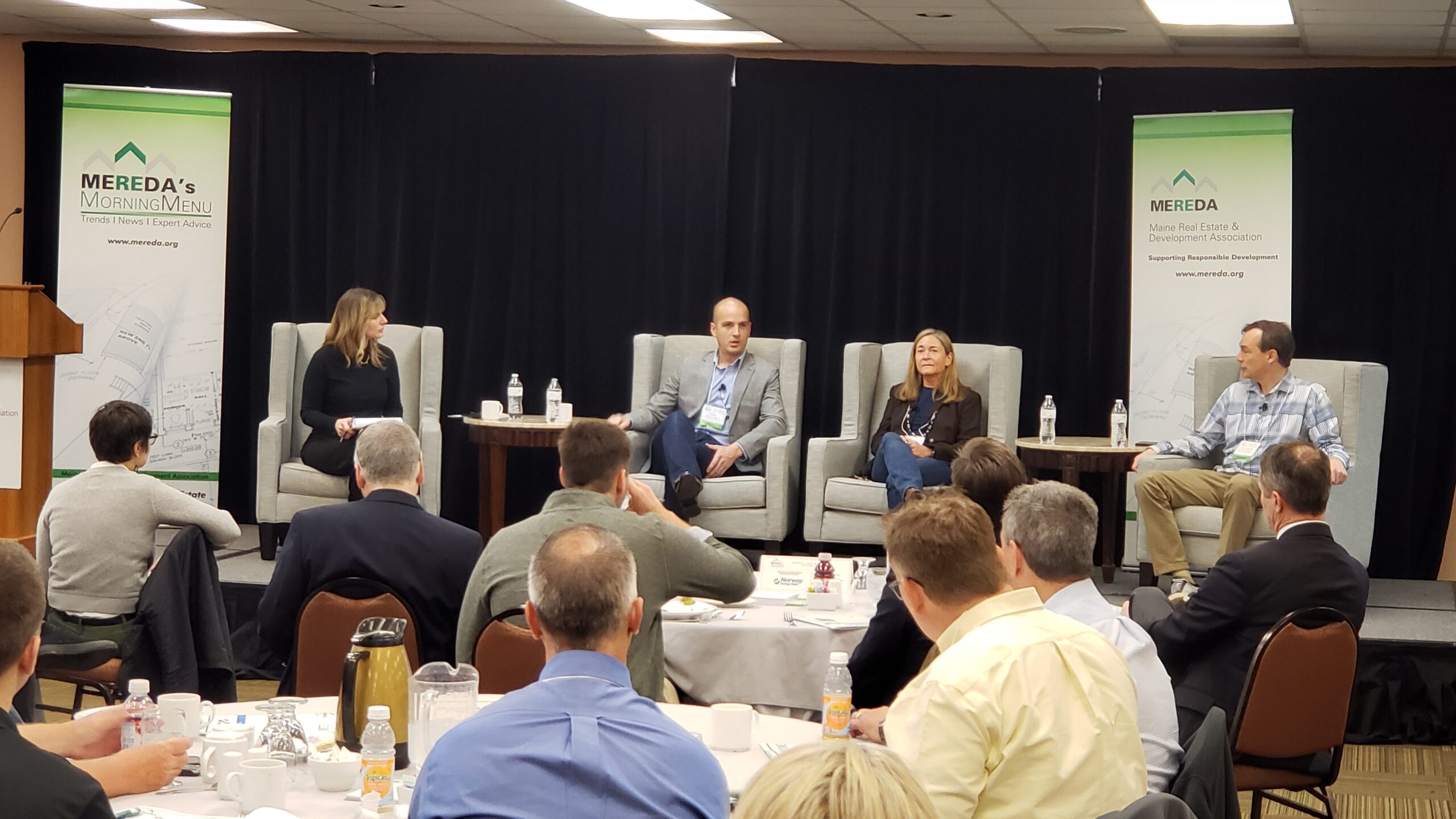 MEREDA breakfast event picture with speakers on stage